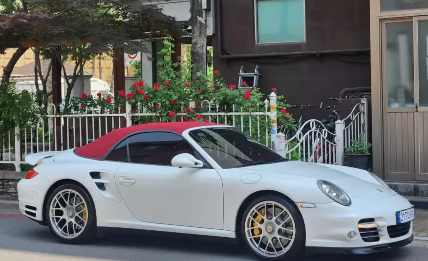 Porsche 911 2010 г. (белый)