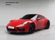 Porsche 911 2023 г. красный фотография