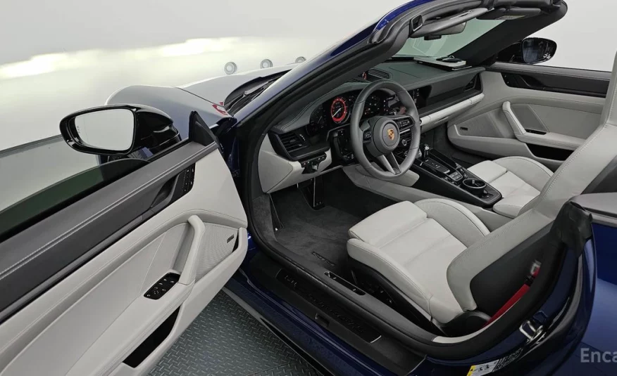 Porsche 911 Carrera 4 GTS Cabriolet 2024 года с пробегом 2126 км